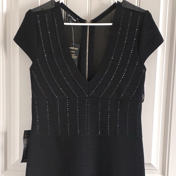 bebe Dresses & Skirts - (NWT) bebe Mini Bandage Dress V-Neck